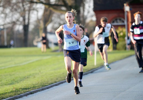 Students running in race